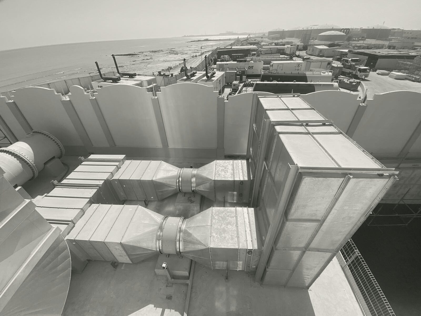 Drywell exhaust units on the roof, the coast behind