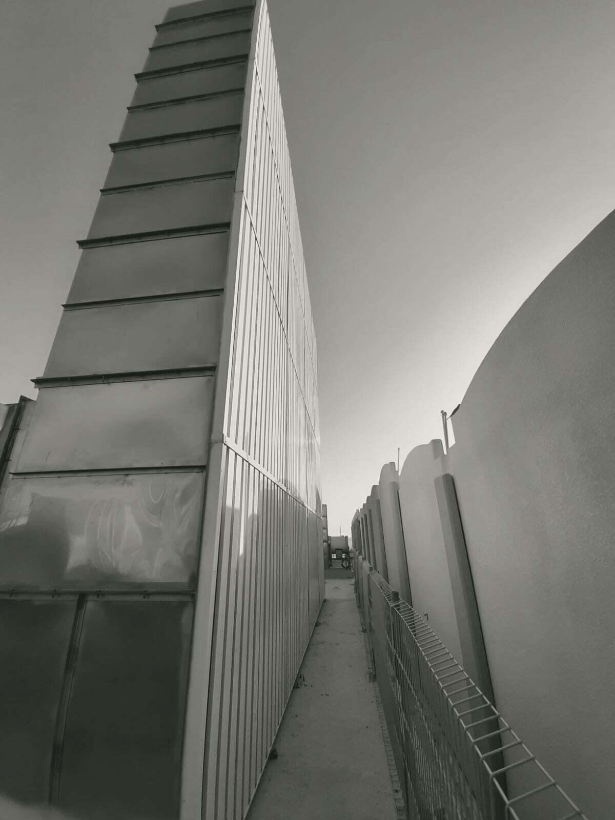 A wet-well plenum rising against the sky